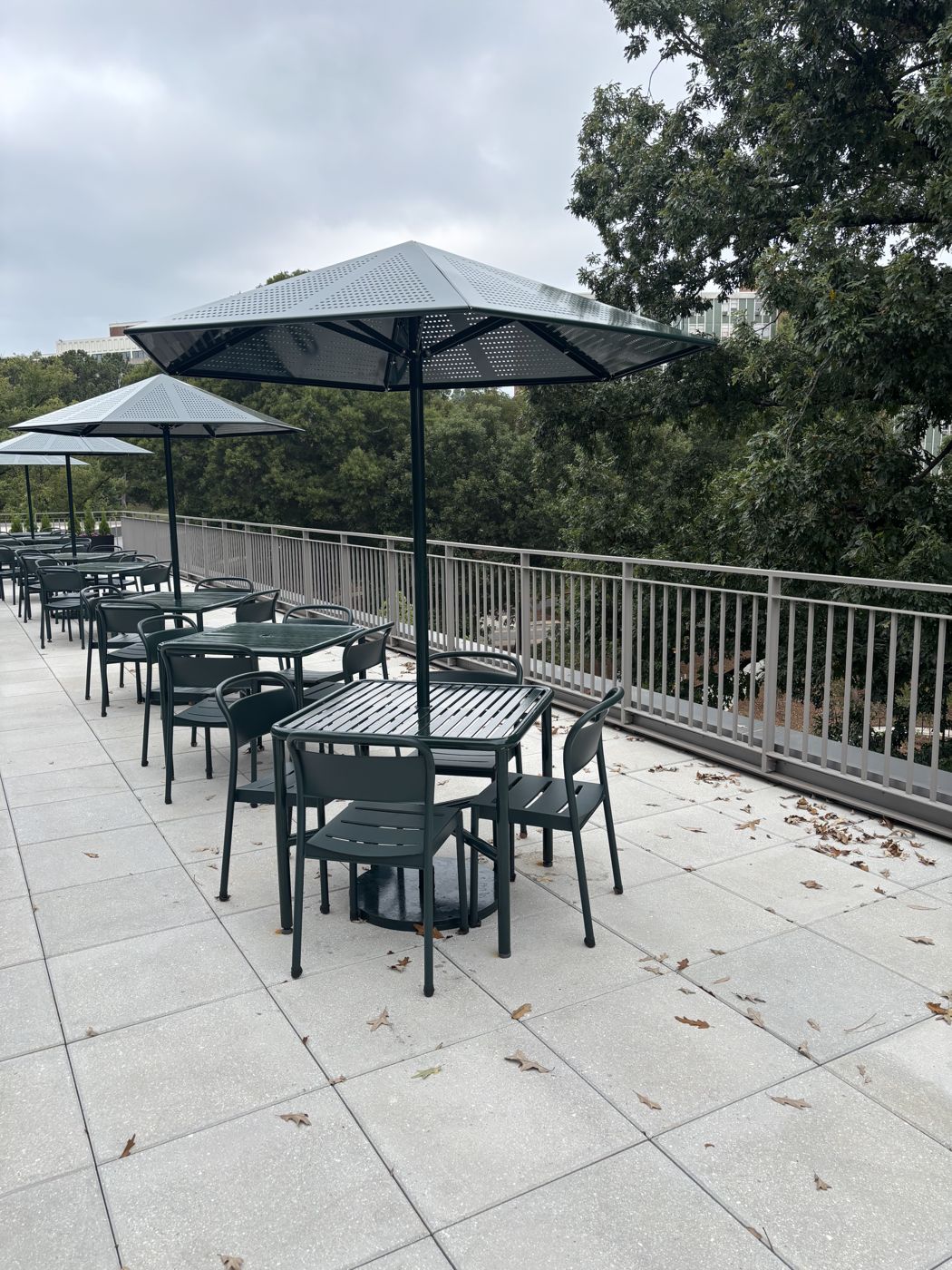 Rooftop patio furniture refinished in green powder coat